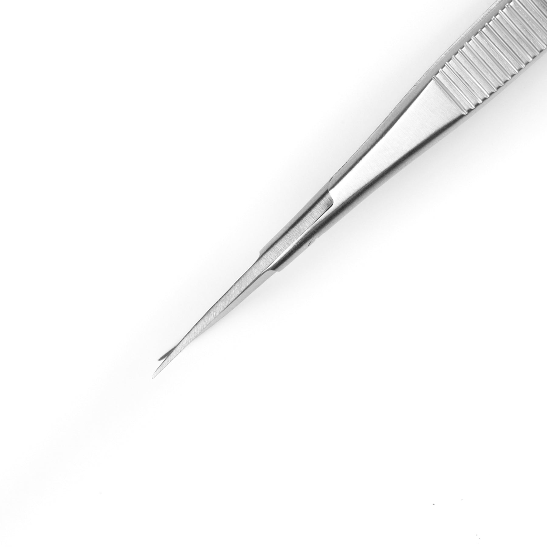 Pair of stainless steel cuticle scissors with curved blades on a white background