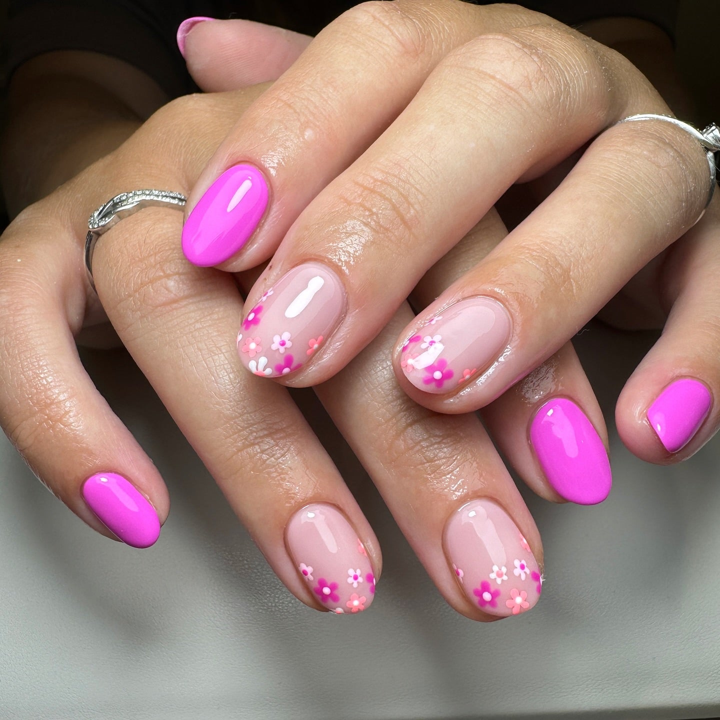 Neon pink gel on natural nails with pink builder gel.