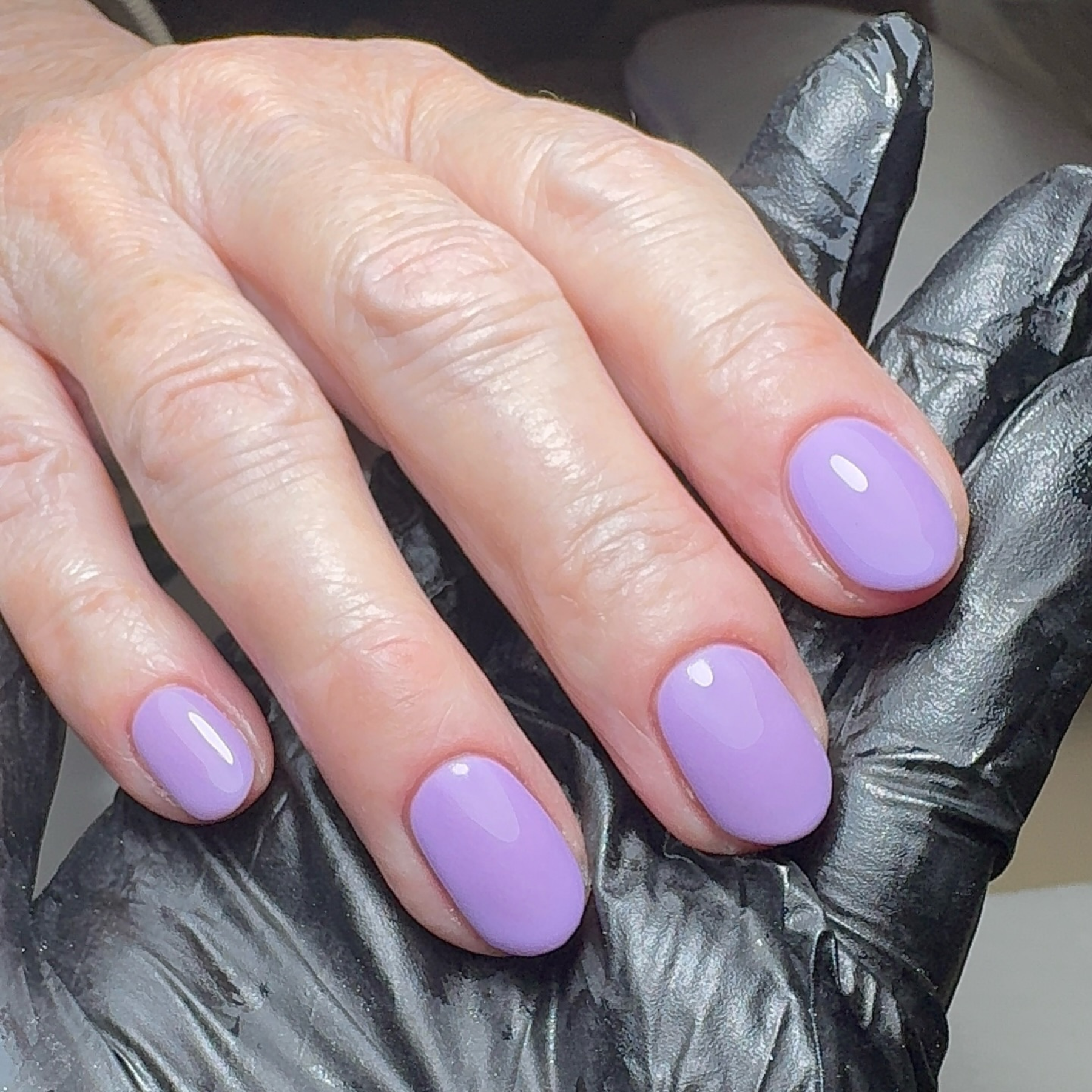 Pastel purploe gel on natural nails.