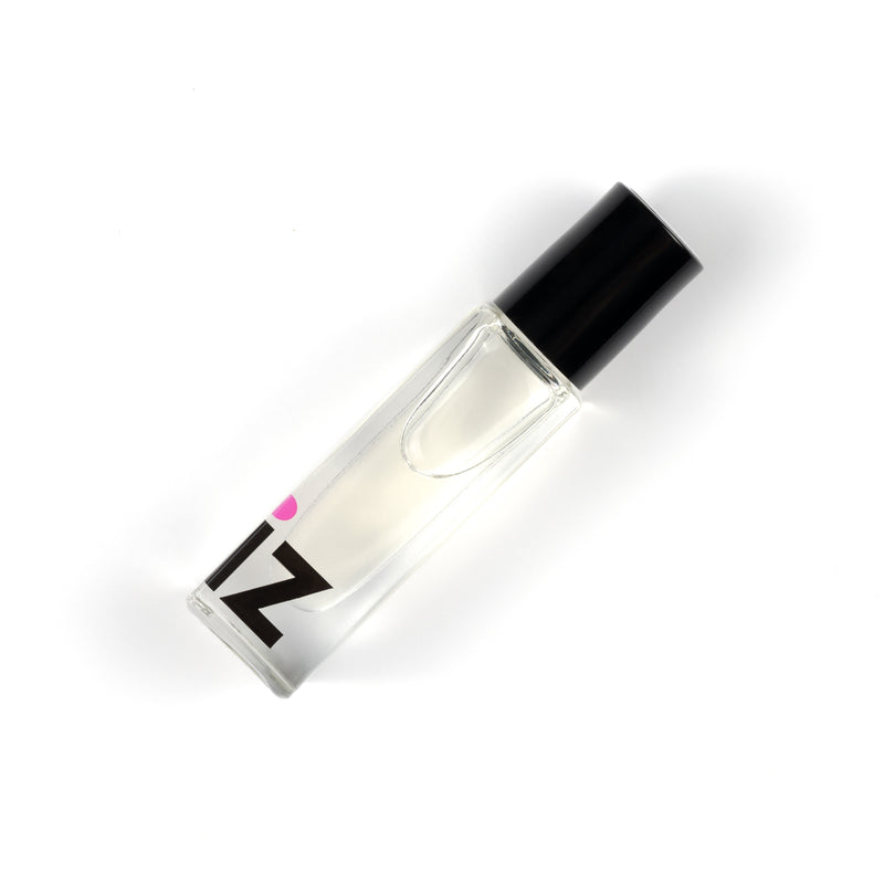 Roll on Cuticle Oil in iZ nails glass bottle. Coconut scented cuticle oil.