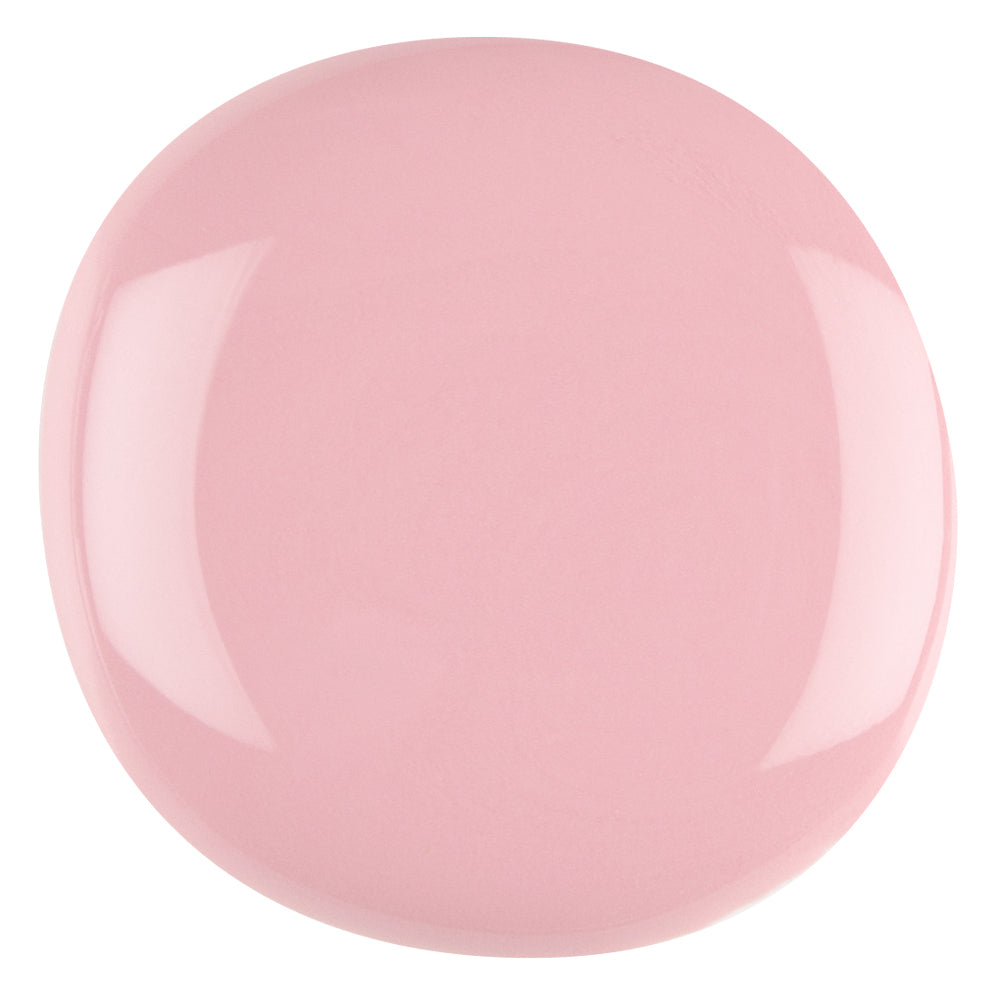 A swatch of Protea Pink nail gel by Pro Colour showing a soft, dusky pink color.